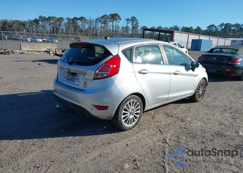 2015 Ford Fiesta Titanium z USA, uszkodzony, nr VIN 3FADP4FJ7FM140837